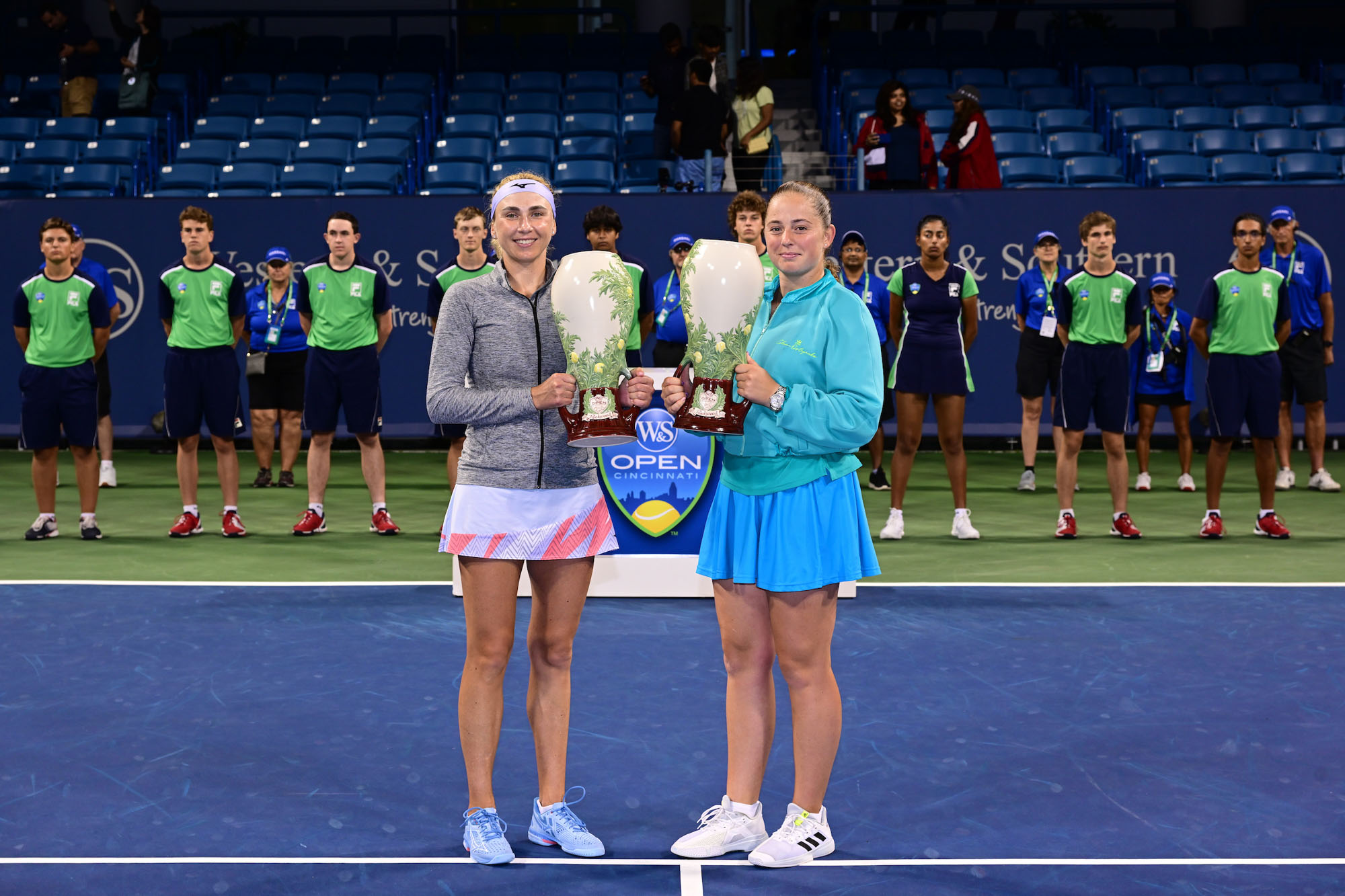 double players with trophy