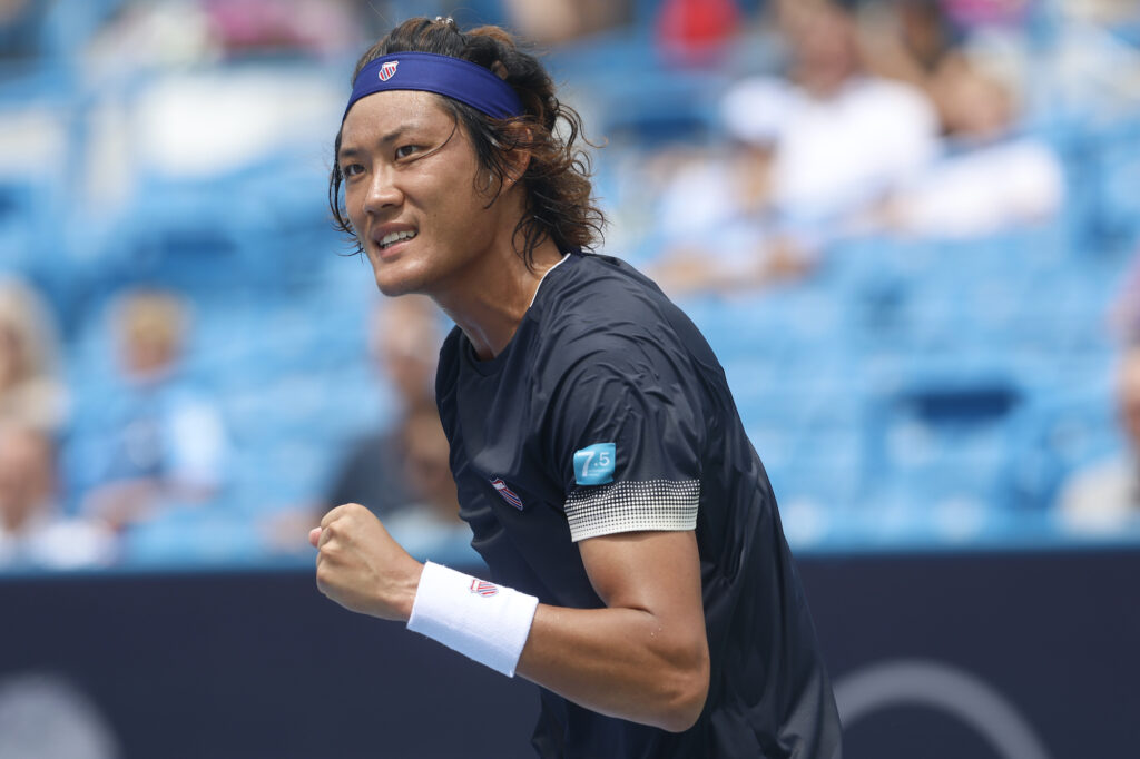 Zhizhen Zhang celebrating at the Western Southern Open