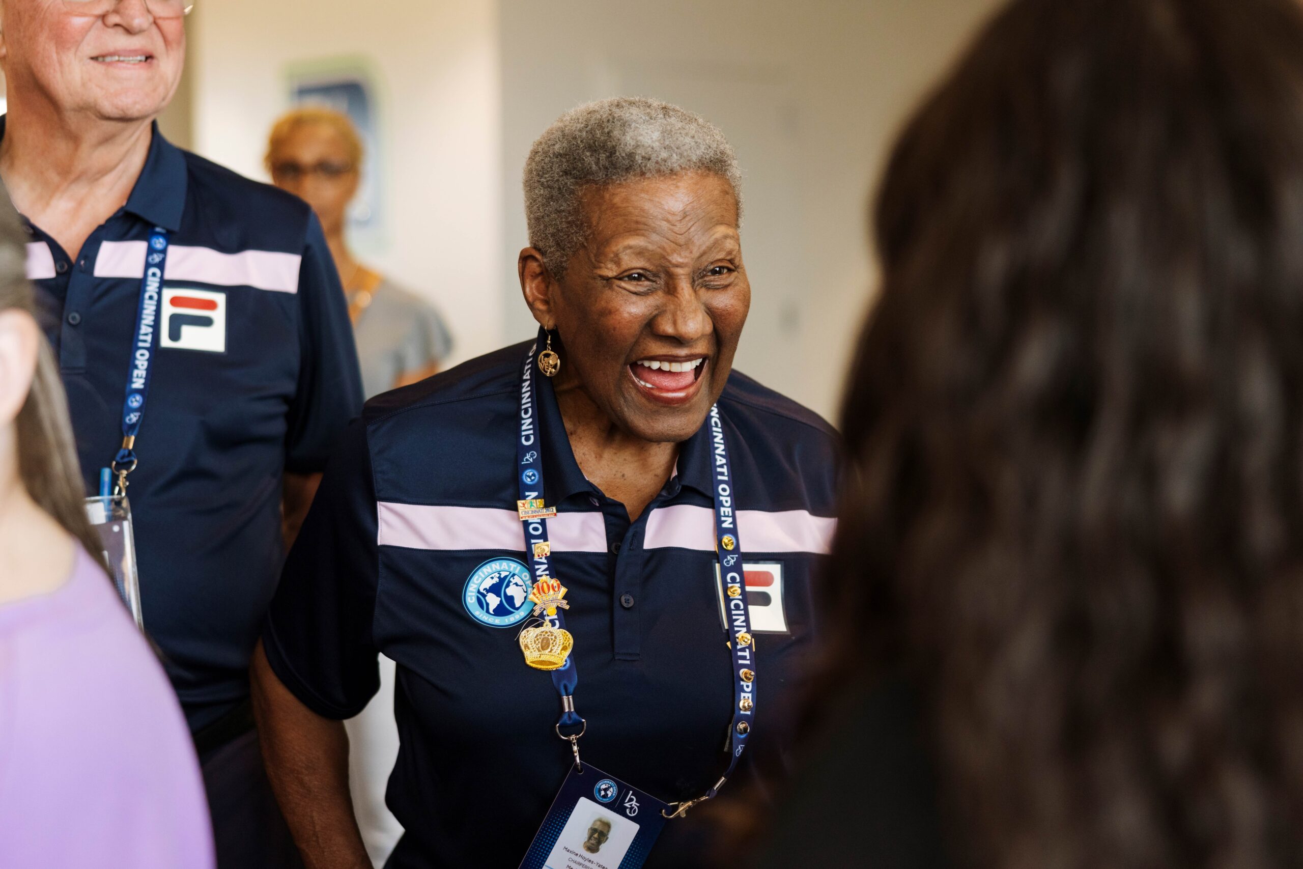 Volunteer in uniform laughs