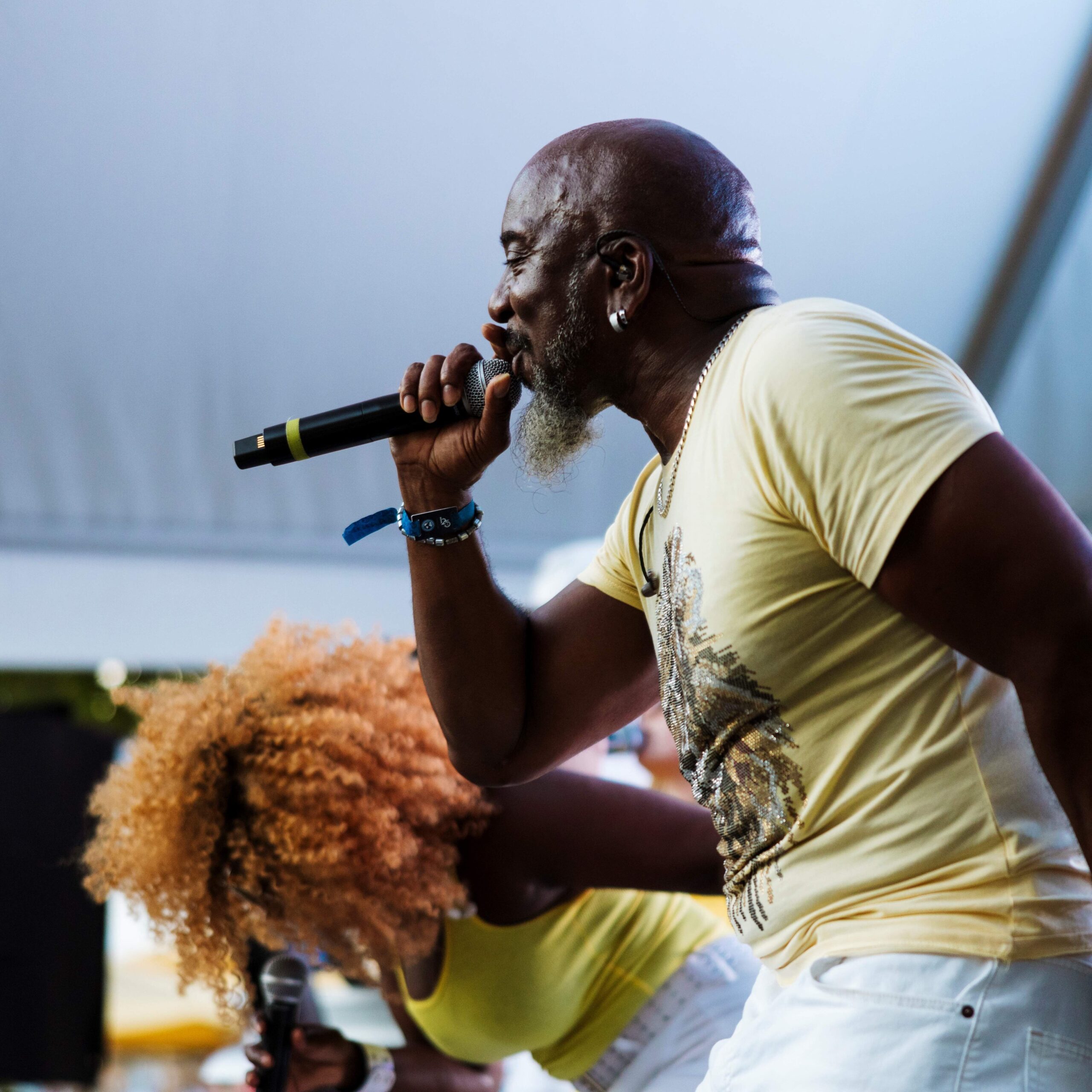 Man singing into a microphone