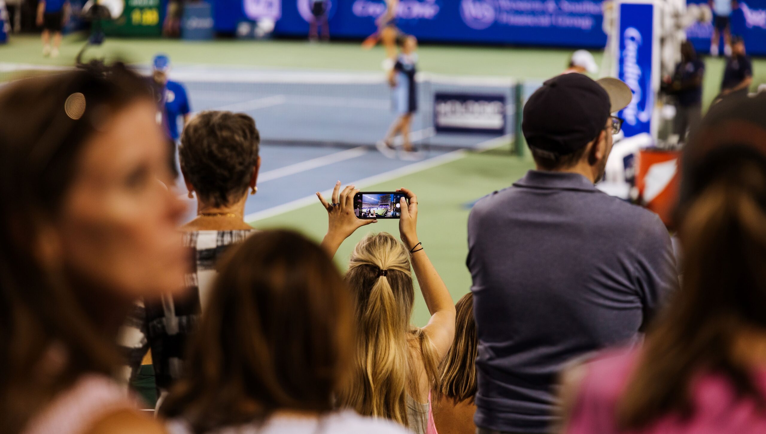 Woman takes photo with phone