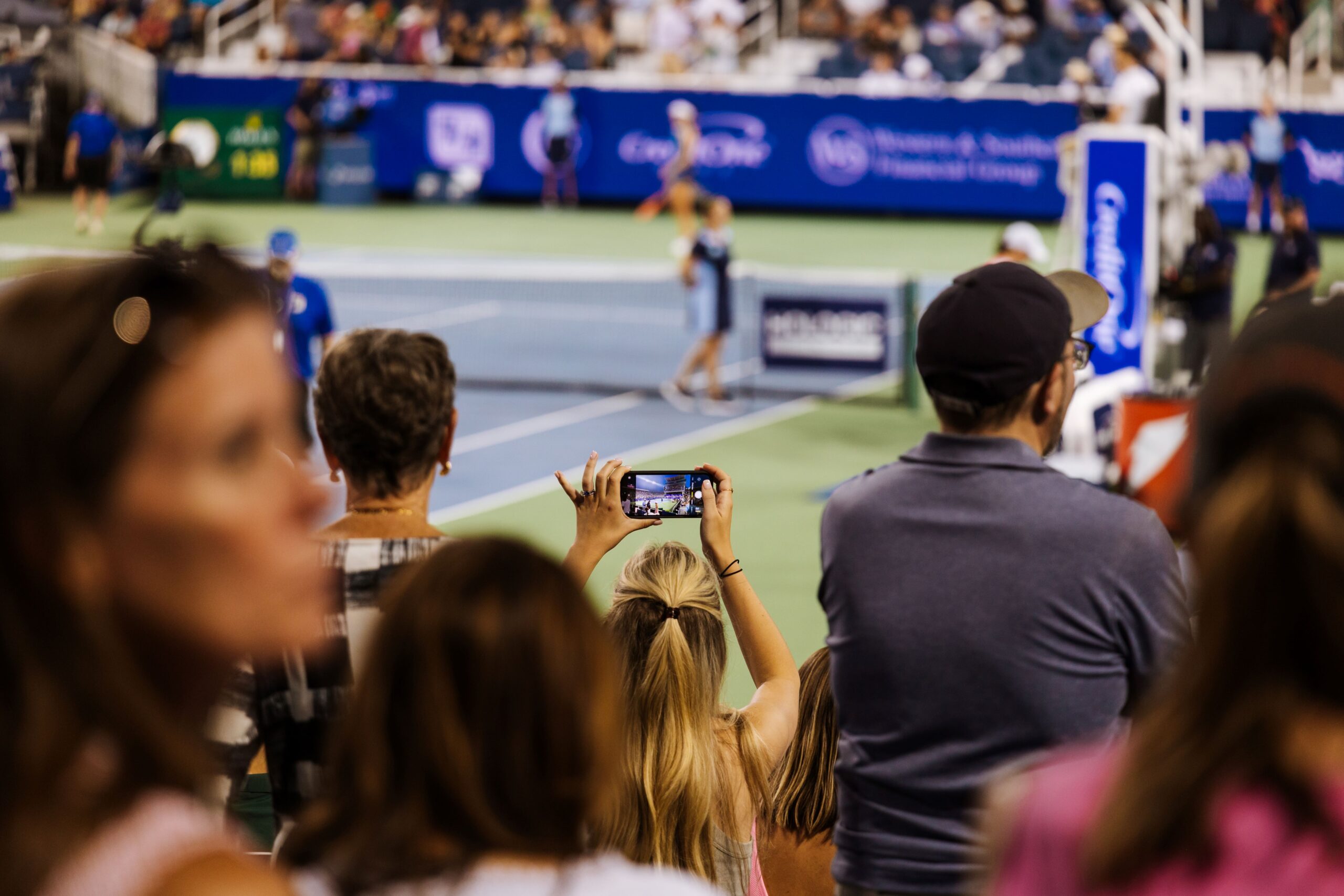 Woman takes photo with phone