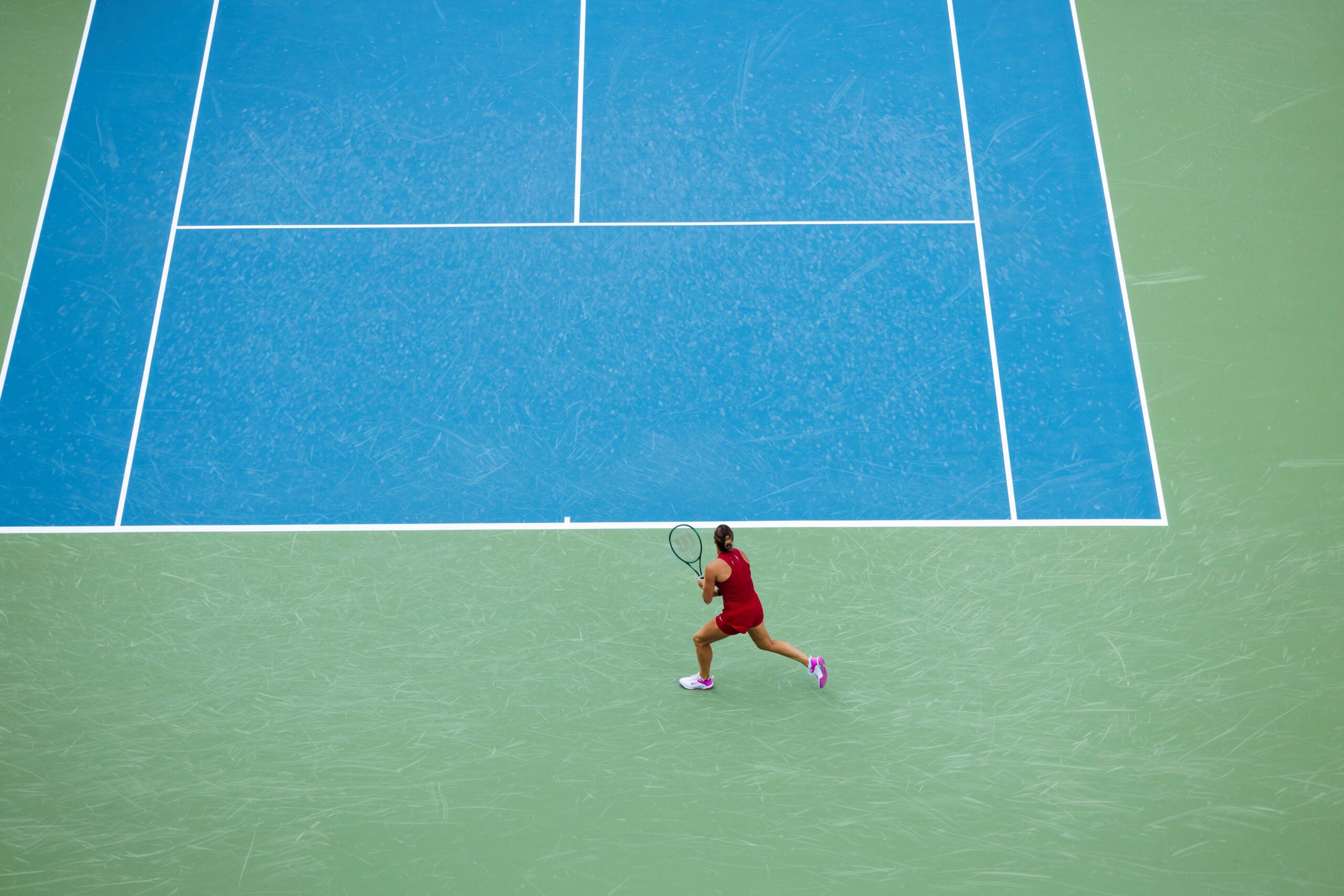 Tennis player prepares to hit a shot