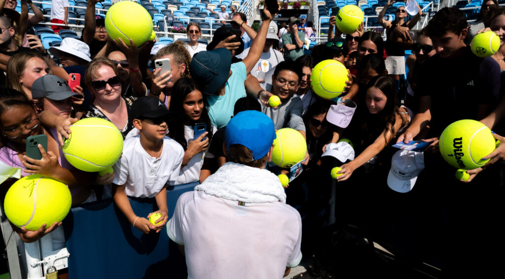 Jannik Sinner signing autographs