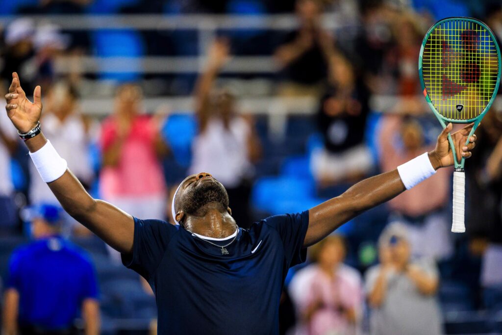 Frances Tiafoe celebrates