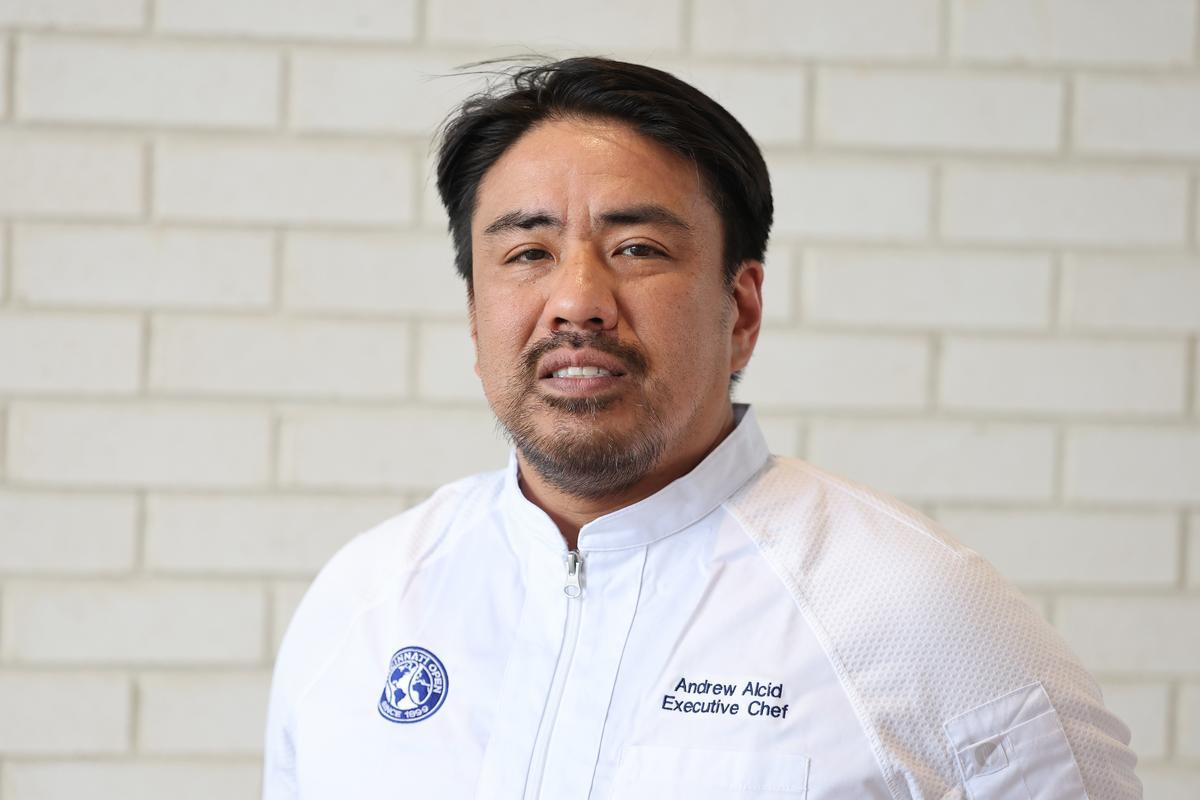 Chef Andrew Alcid smiles