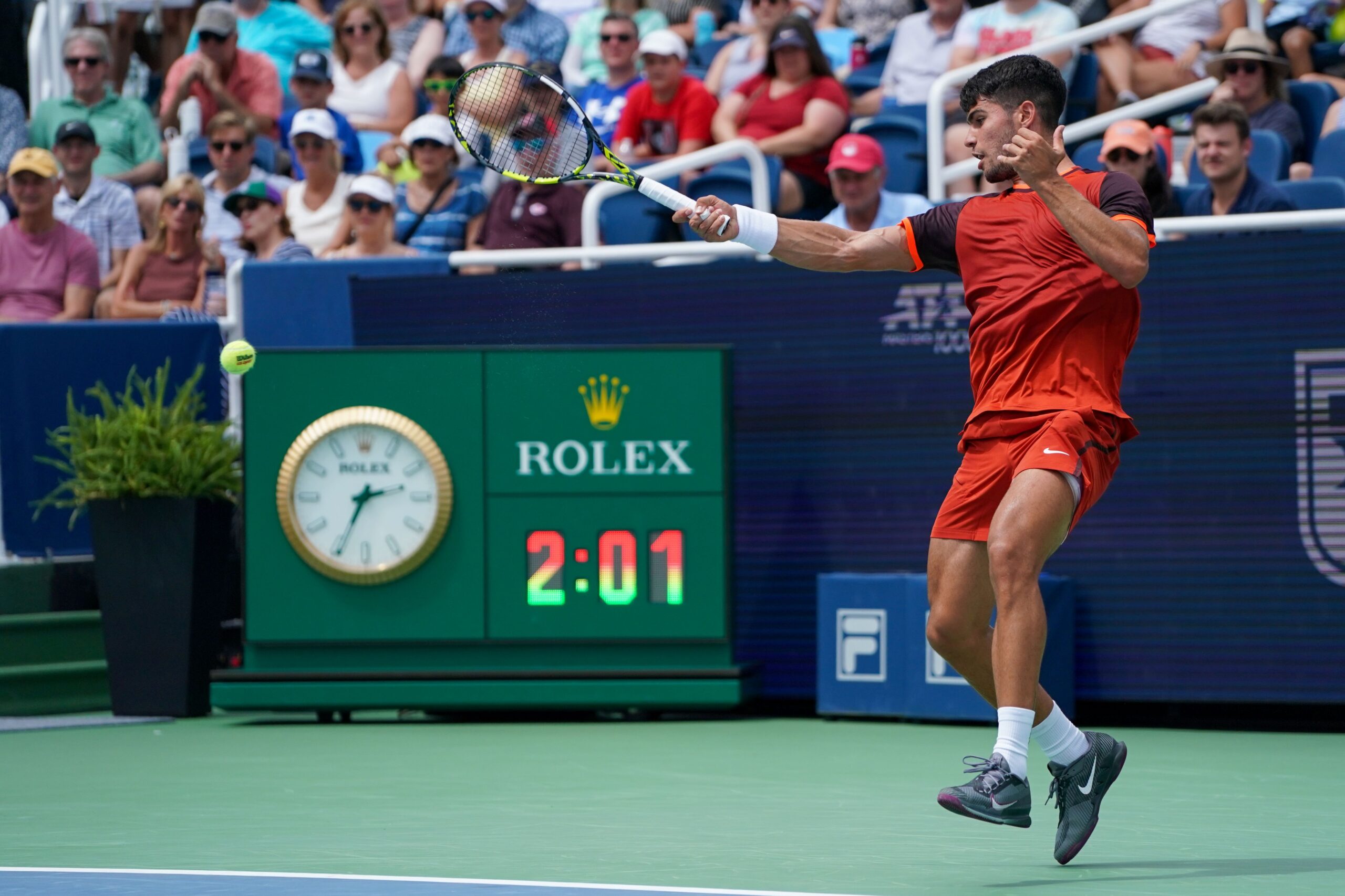 Carlos Alcaraz hits tennis ball