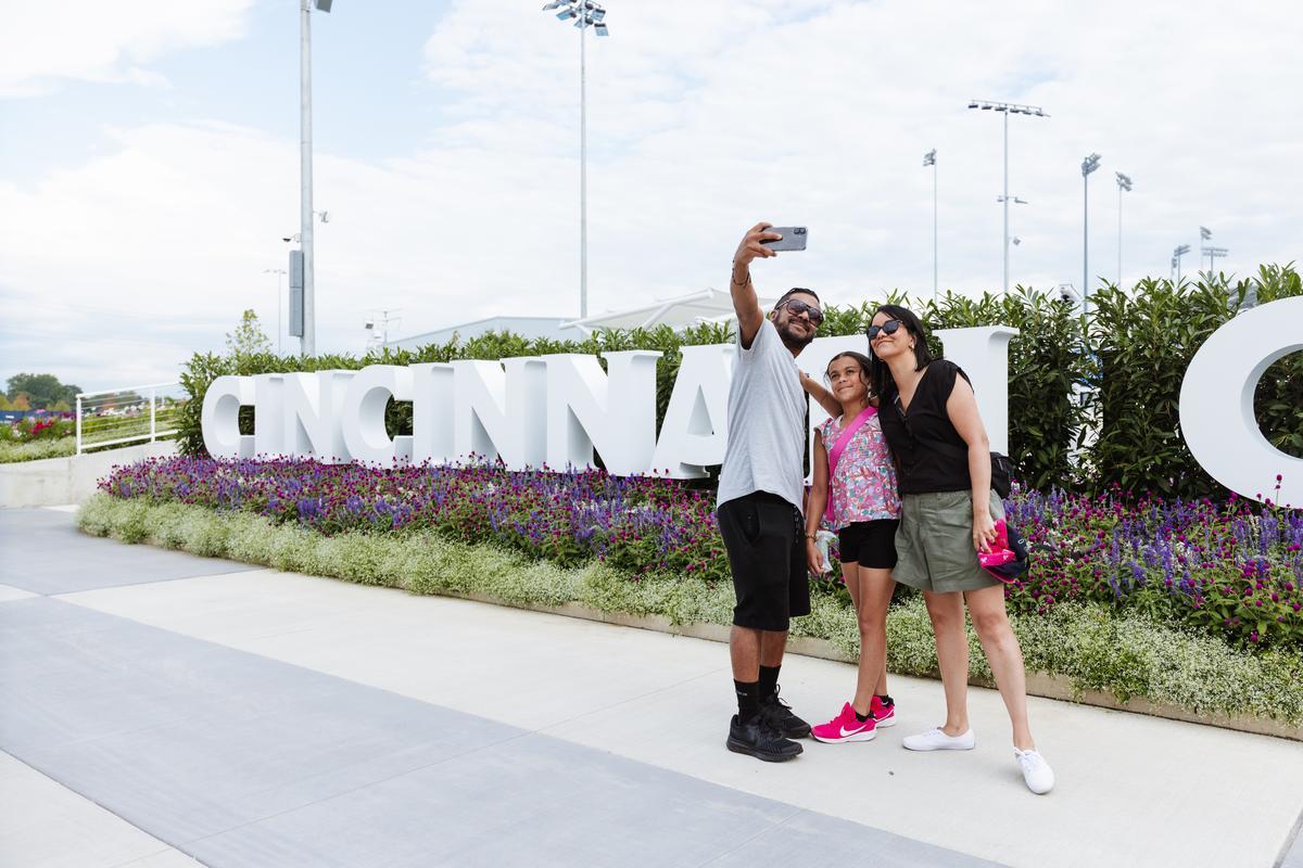Family taking selfie in front of