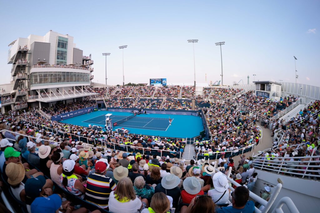 Wide shot view of a match on grandstand court