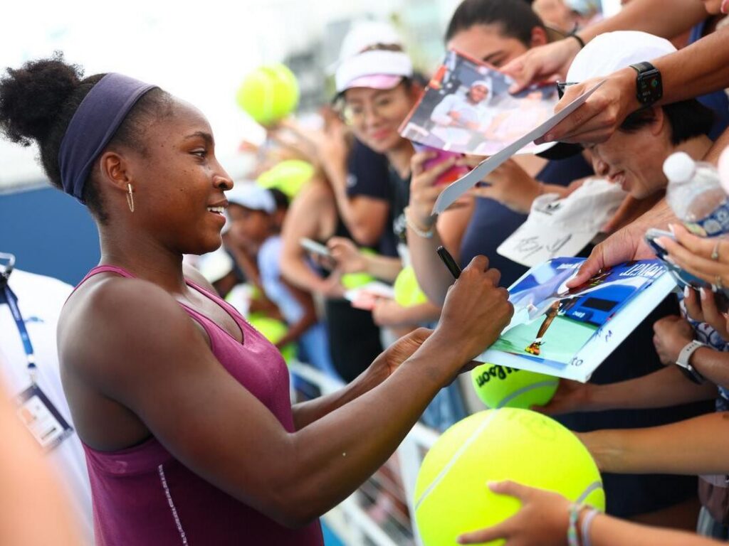 Coco Gauff signing autographs